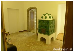 Empfang mit Kachelofen